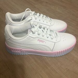 White puma sneakers with pink and blue details
